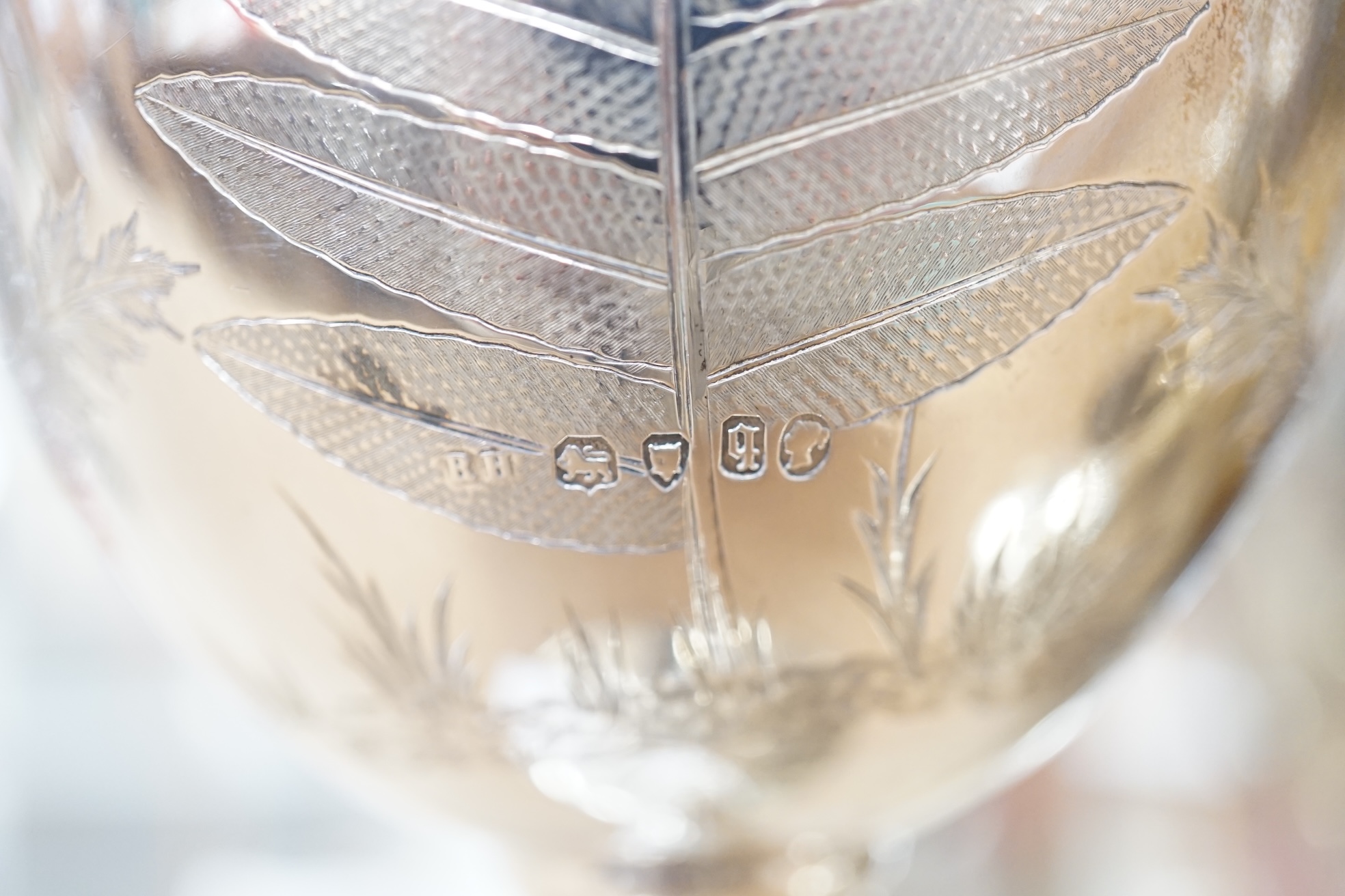 A Victorian engraved silver goblet, by Robert Harper, London 1871, with later engraved Greyhound Racing Association Ltd presentation inscription, 23.1cm, one other damaged silver trophy cup and two modern silver wine lab